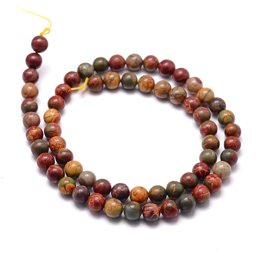 A strand of 58+ picasso jasper beads, multicoloured, 6mm in size, round shaped