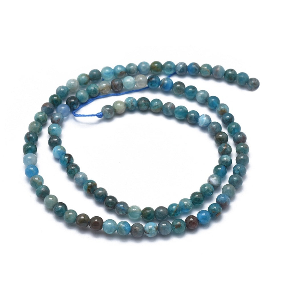 A strand of 90+ apatite beads, blue in colour, 4mm in size, round shaped
