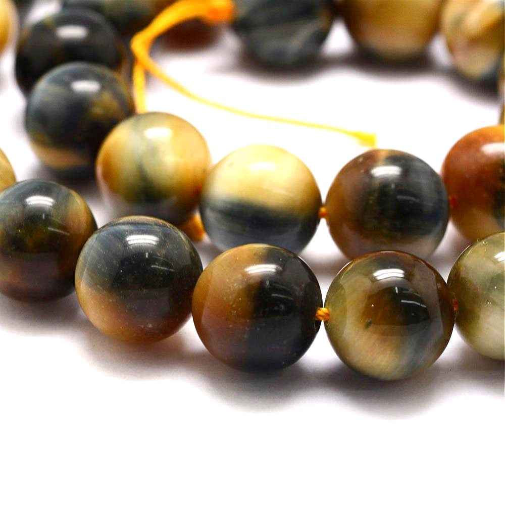 A strand of 60+ tiger eye beads, yellow and blue in colour, 6mm in size, round shaped