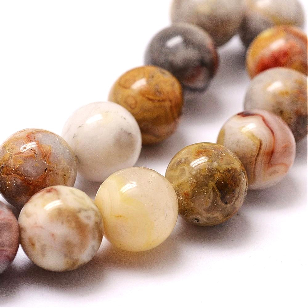 A strand of 65+ crazy lace agate beads, beige and grey in colour, 6mm in size, round shaped