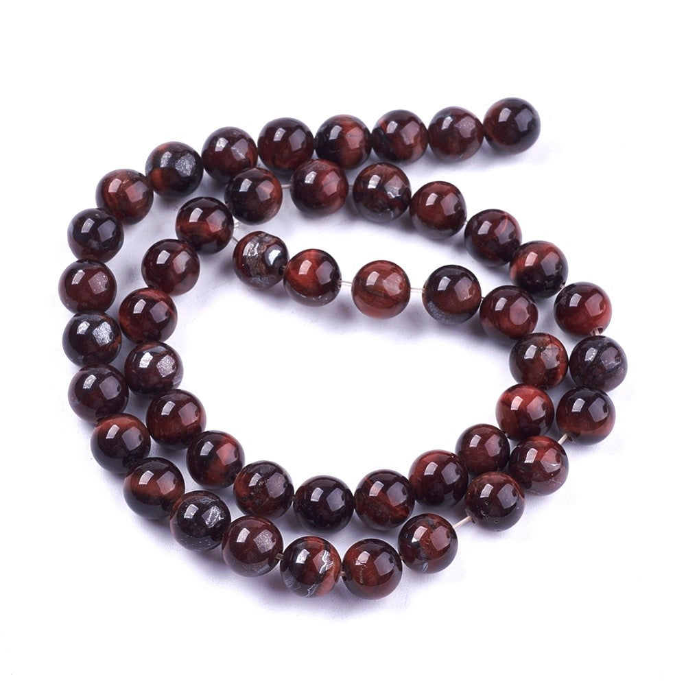 A strand of 44+ tiger eye beads, red and brown in colour, 8mm in size, round shaped