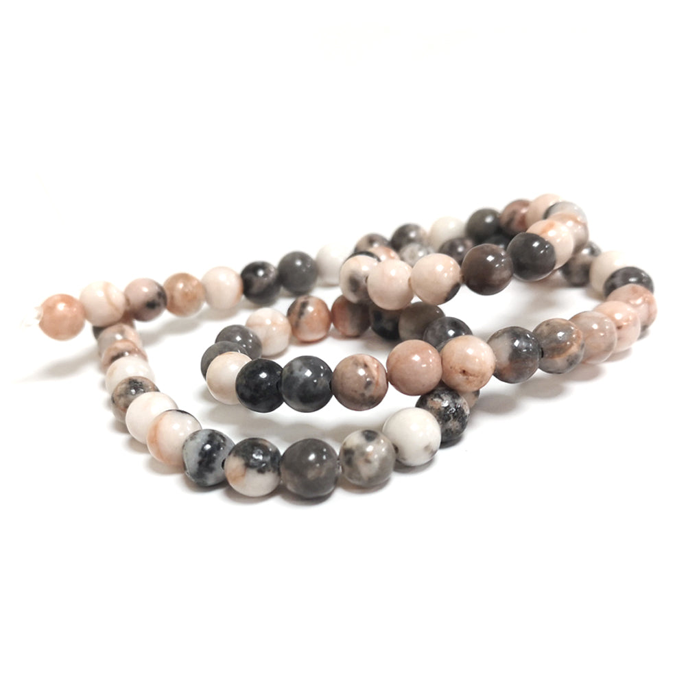 A strand of 62+ zebra jasper beads, brown and pink in colour, 6mm in size, round shaped