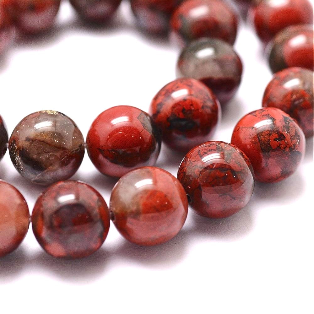 A strand of 60+ Poppy Jasper beads, red in colour, 6mm in size, round shaped