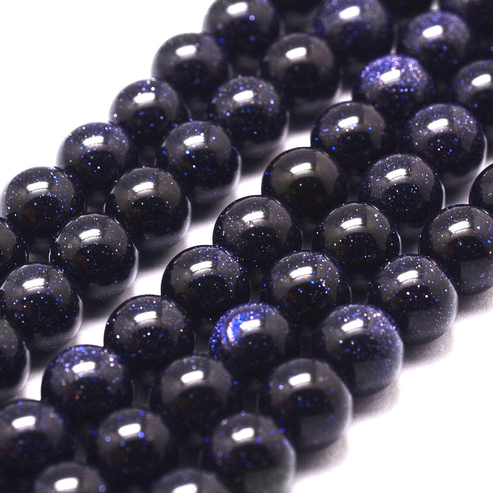 A strand of 45+ goldstone beads, blue in colour, 8mm in size, round shaped