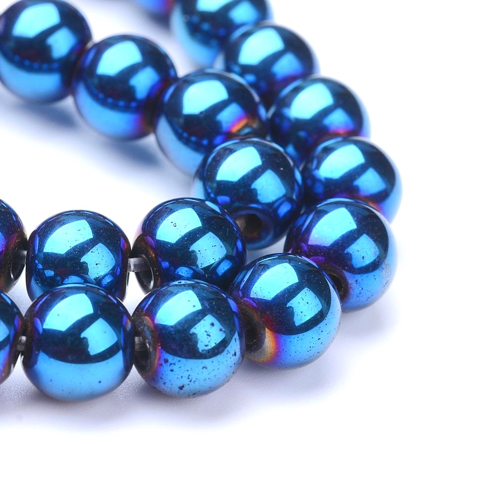 A strand of 64+ hematite beads, blue and purple in colour, 6mm in size, round shaped, non-magnetic