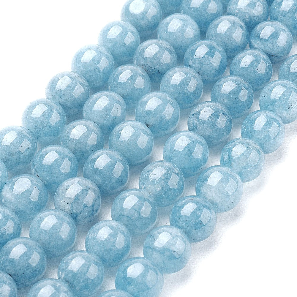 A strand of 60+ sponge quartz beads, blue in colour, 6mm in size, round shaped