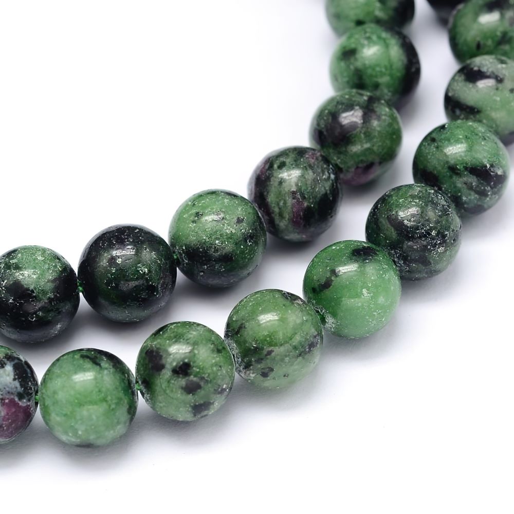A strand of 57+ ruby in zoisite beads, green and fuchsia in colour, 6mm in size, round shaped