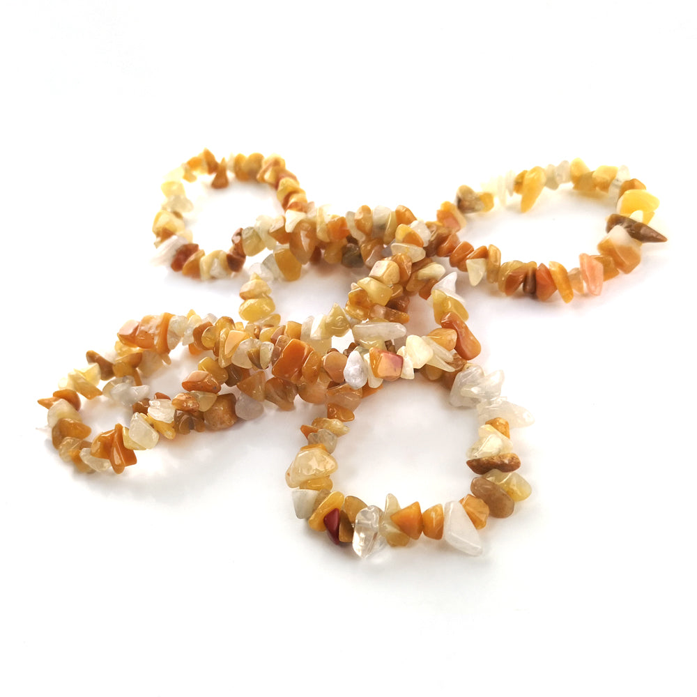 A strand of 240+ honey jade beads, yellow in colour, 5-8mm in size, chip shaped