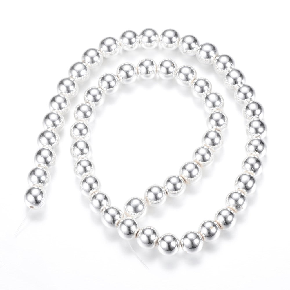 A strand of 48+ hematite beads, silver in colour, 8mm in size, round shaped, non magnetic