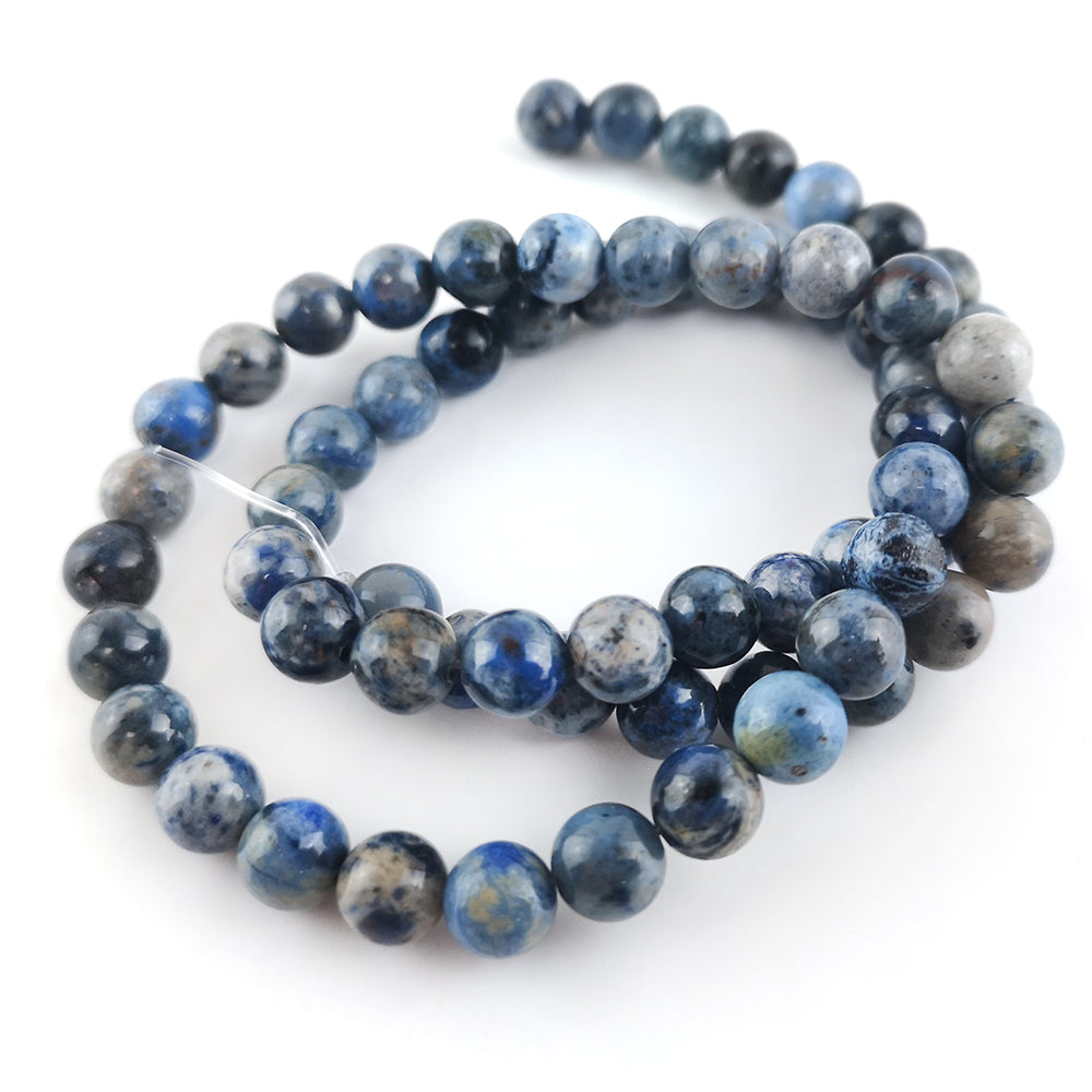 A strand of 60+ dumortierite beads, blue in colour, 6mm in size, round shaped