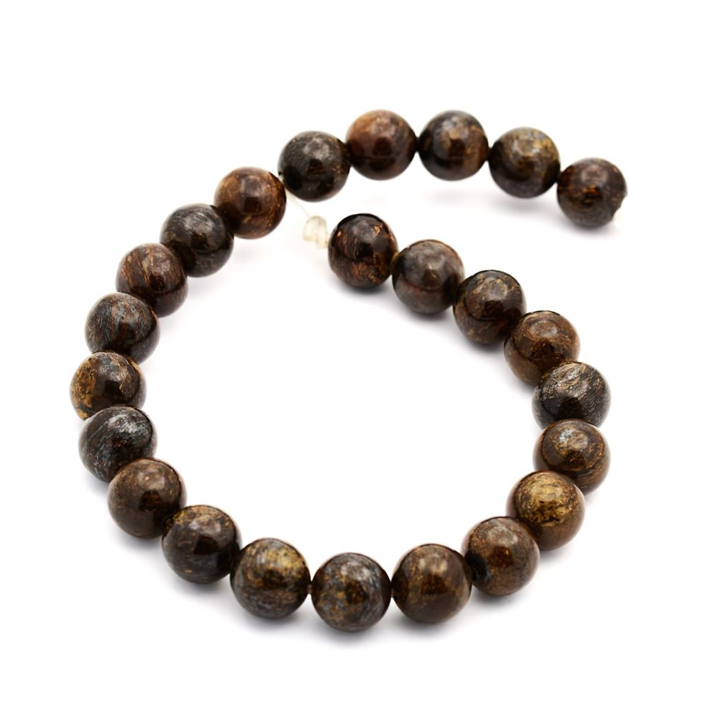 A strand of 25+ bronzite beads, brown in colour, 6mm in size, round shaped