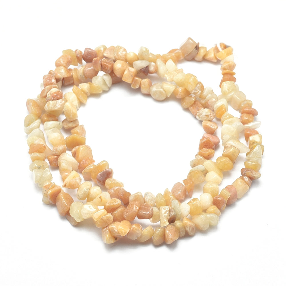 A strand of 240+ aventurine beads, yellow in colour,  6-12mm in size, chip shaped