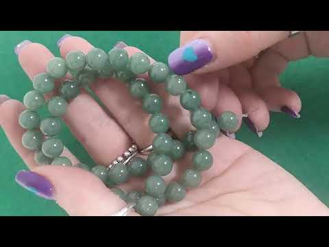 A strand of 42+ aventurine beads, green in colour, 8mm in size, round shaped