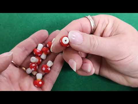 A pack of 10 lampwork beads, red and white in colour, 12x18mm in size, mushroom shaped