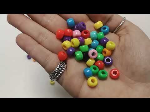 A pack of 100+ Acrylic pony beads, rainbow colours, 9x6mm in size, rondelle shaped with large hole