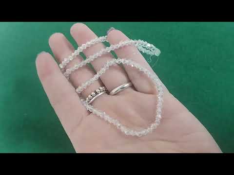 A strand of 120+ czech crystal beads, clear in colour, 3mm in size, bicones, faceted