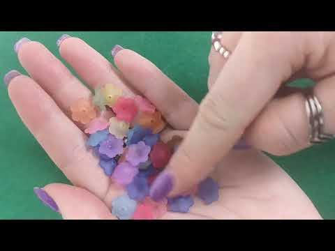 A pack of 100+ lucite beads, mixed-colours, 5x11mm in size, Flower shaped