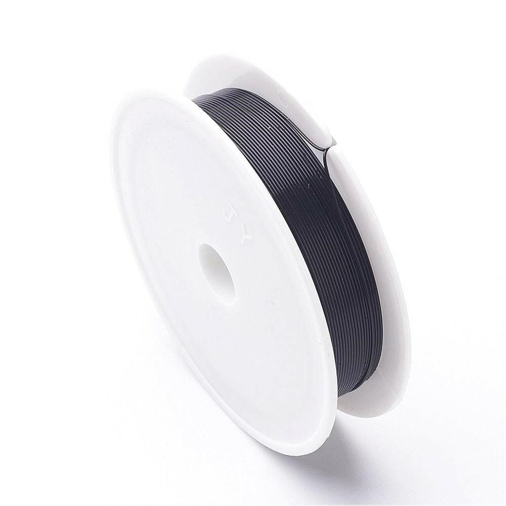 A 20 metre length of iron craft wire, black enamelled, 0.3m metre length of thick, supplied on a spool