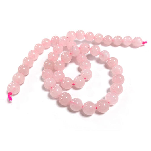 A strand of 45+ rose quartz beads, pink in colour, 8mm in size, round shaped