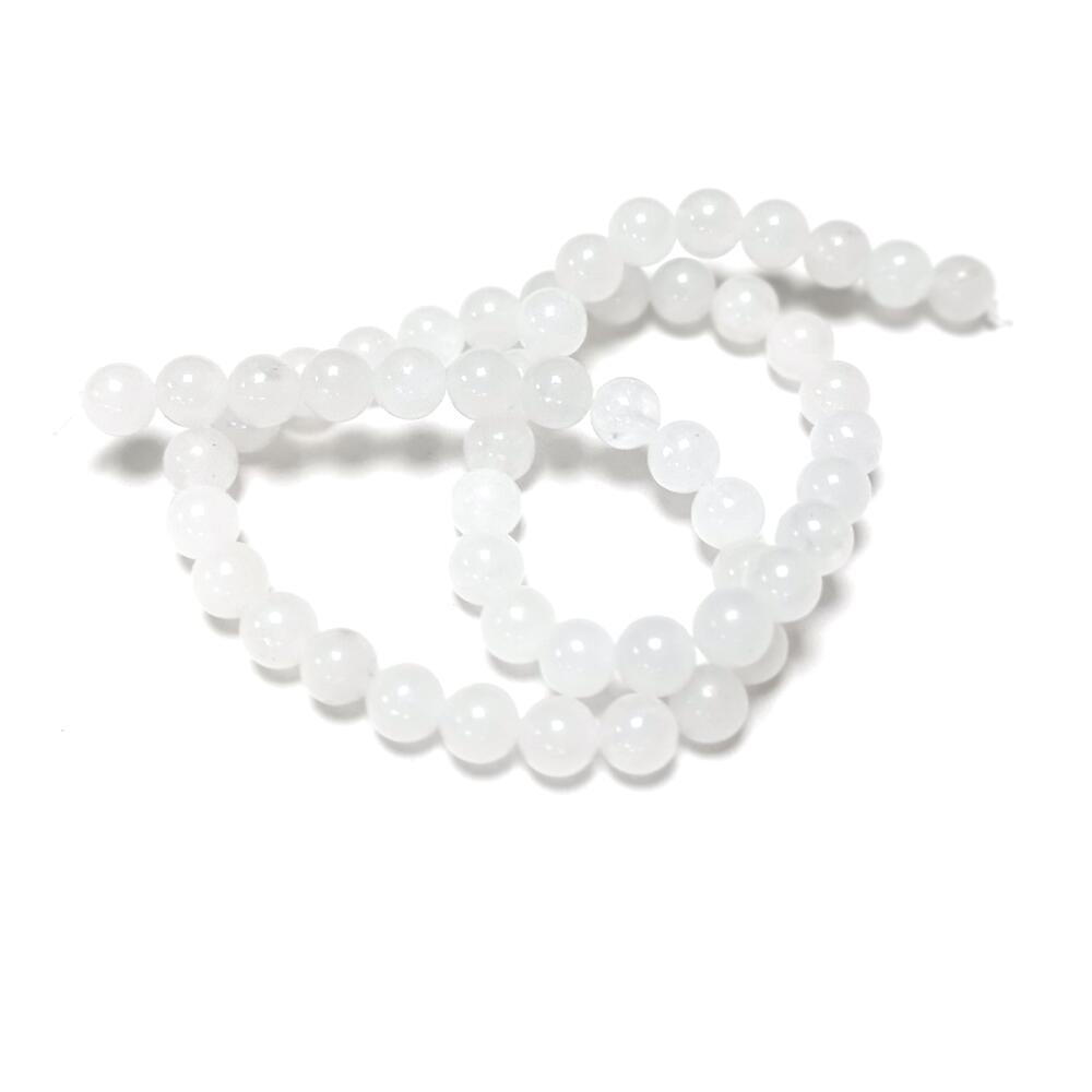 A strand of 64+ snow quartz beads, white in colour, 6mm in size, round shaped