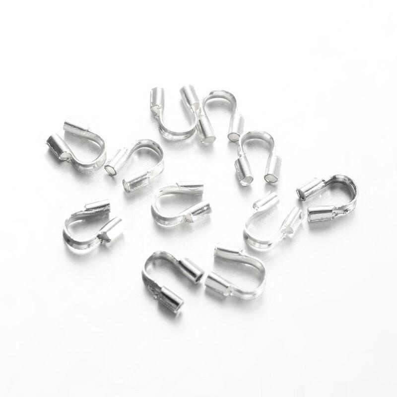 A pack of 200 brass wire guardians, silver in colour, 4x5mm in size, horseshoe shaped