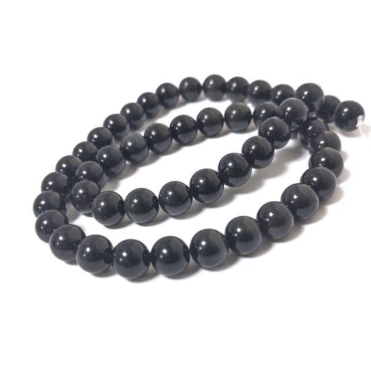 A strand of 45+ obsidian beads, black in colour, 8mm in size, round shaped
