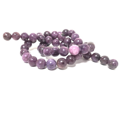 A strand of 48+ lepidolite beads, purple in colour, 8mm in size, round shaped