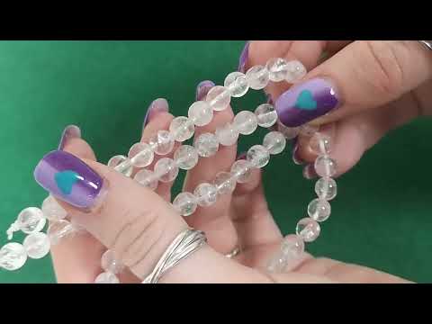 A strand of 58+ Rock Crystal beads, clear in colour, 6mm in size, round shaped