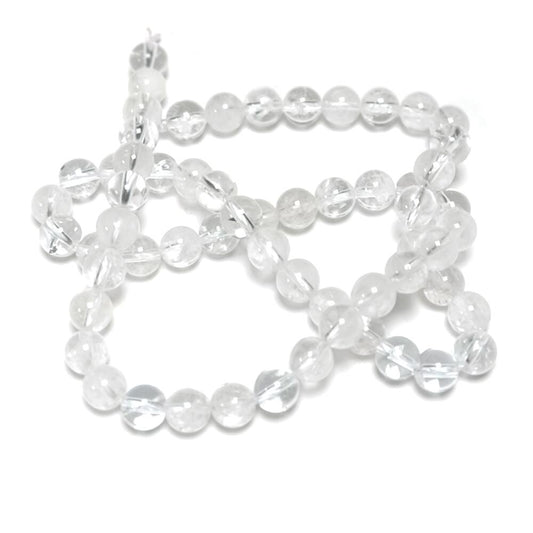 A strand of 58+ Rock Crystal beads, clear in colour, 6mm in size, round shaped