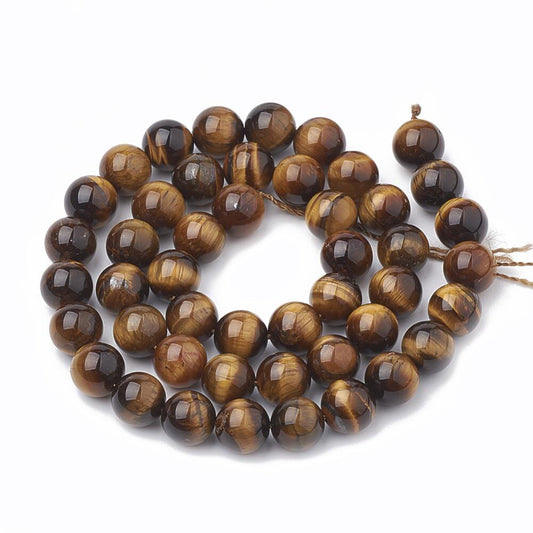 A strand of 45+ tiger eye beads, yellow and brown in colour, 8mm in size, round shaped
