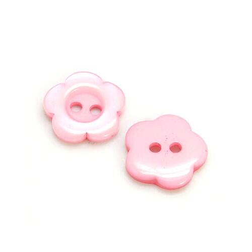 A pack of 50+ resin buttons, pink in colour, 15mm in size, flower shaped, 2-hole